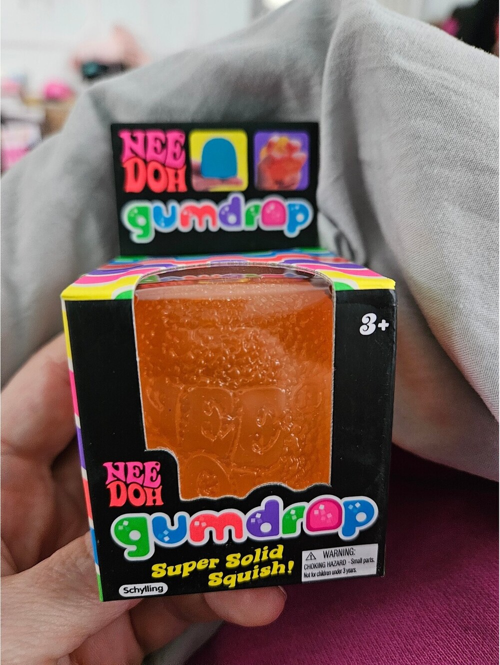 Schylling NeeDoh Gumdrop Super Solid Squish – Orange